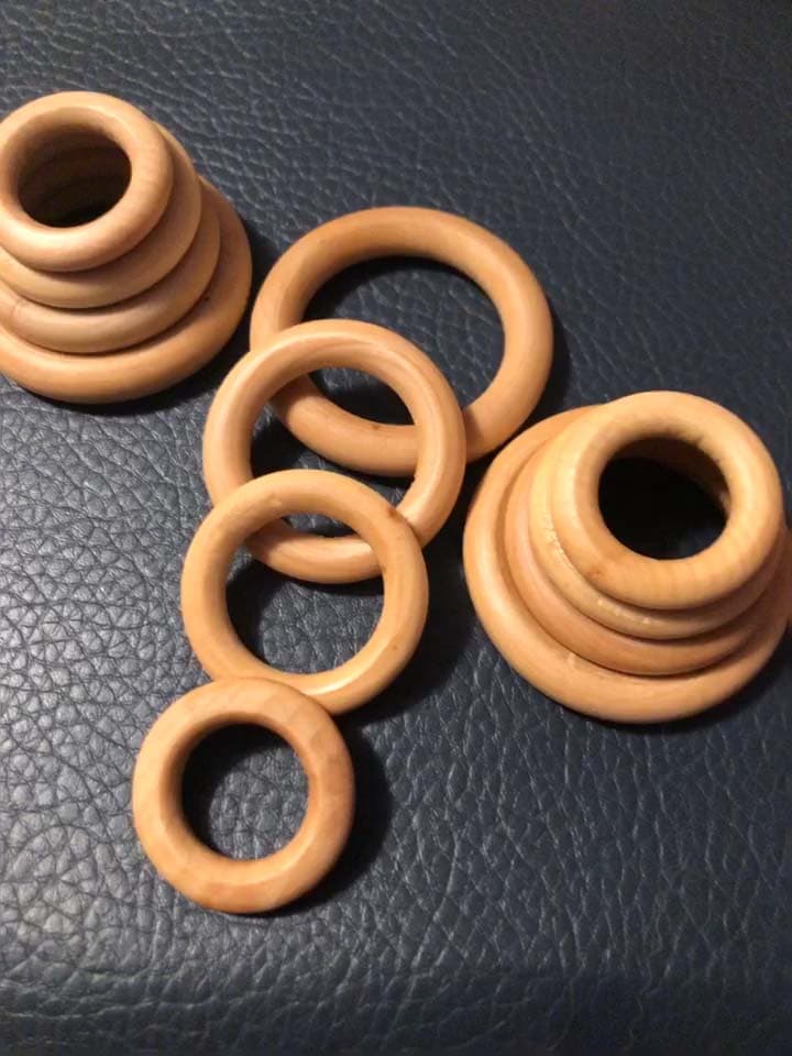 Handcrafted wooden rings in various sizes